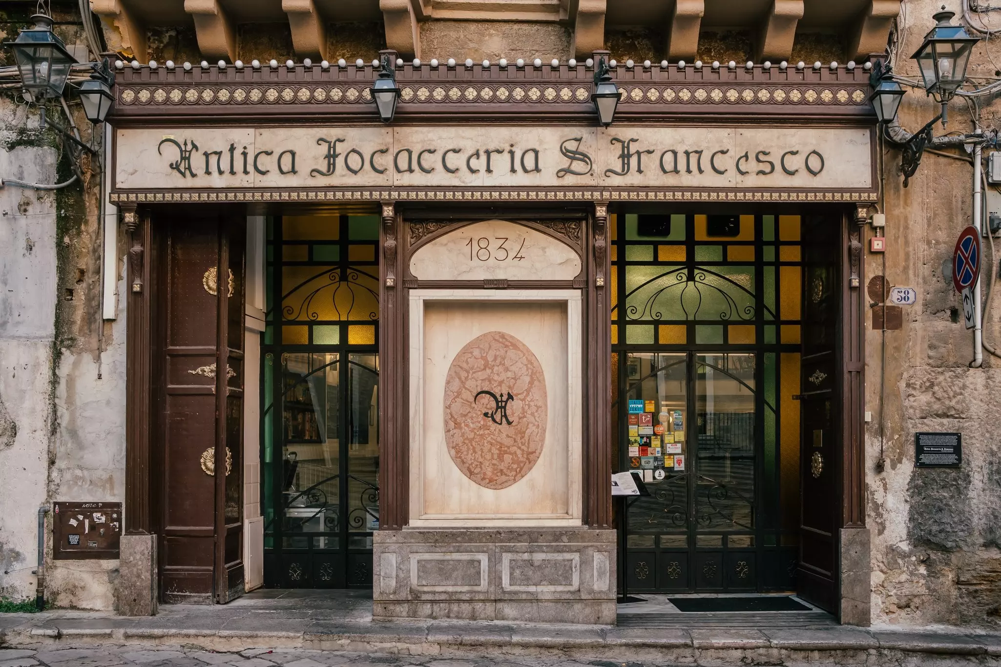 Entrance to the historic Antica Focacceria San Francesco restaurant in Palermo, Sicily.