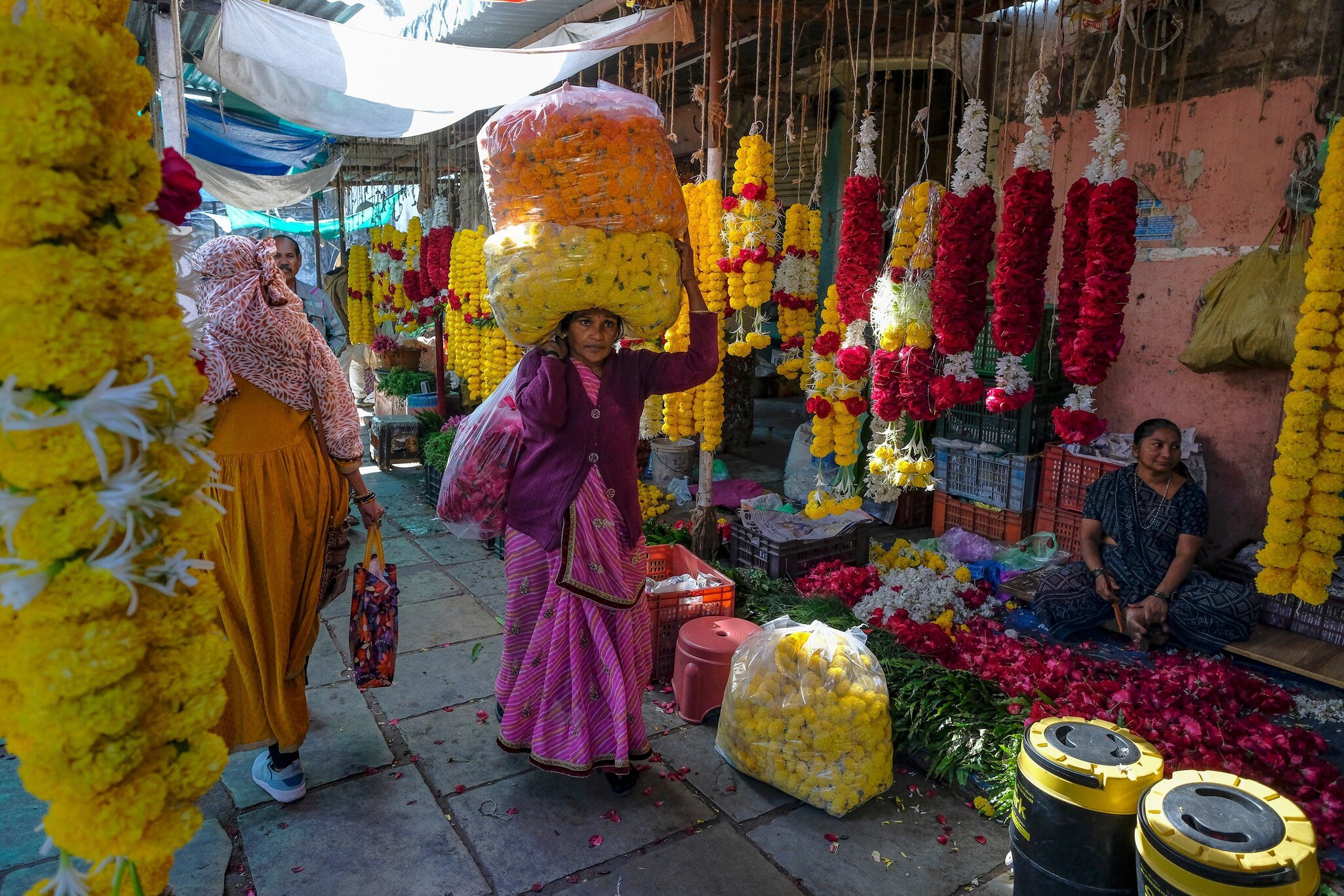 Flower sellers at the Khanderao Market in Vadodara, Gujarat, India.
