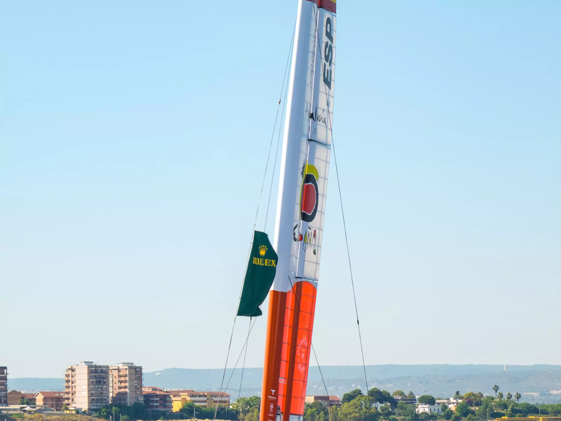 Taranto, Italy - June 4, 2021: Grand Prix F50 catamarans during the inaugural parade seen frontally as they cross the navigable canal, Spanish team., License Type: media, Download Time: 2025-09-02T21:15:01.000Z, User: rhylton_redventures, Editorial: true, purchase_order: 65050 - Digital Destinations and Articles, job: Lonely Planet, client: social guide to extreme sports, other: Rhianydd Hylton