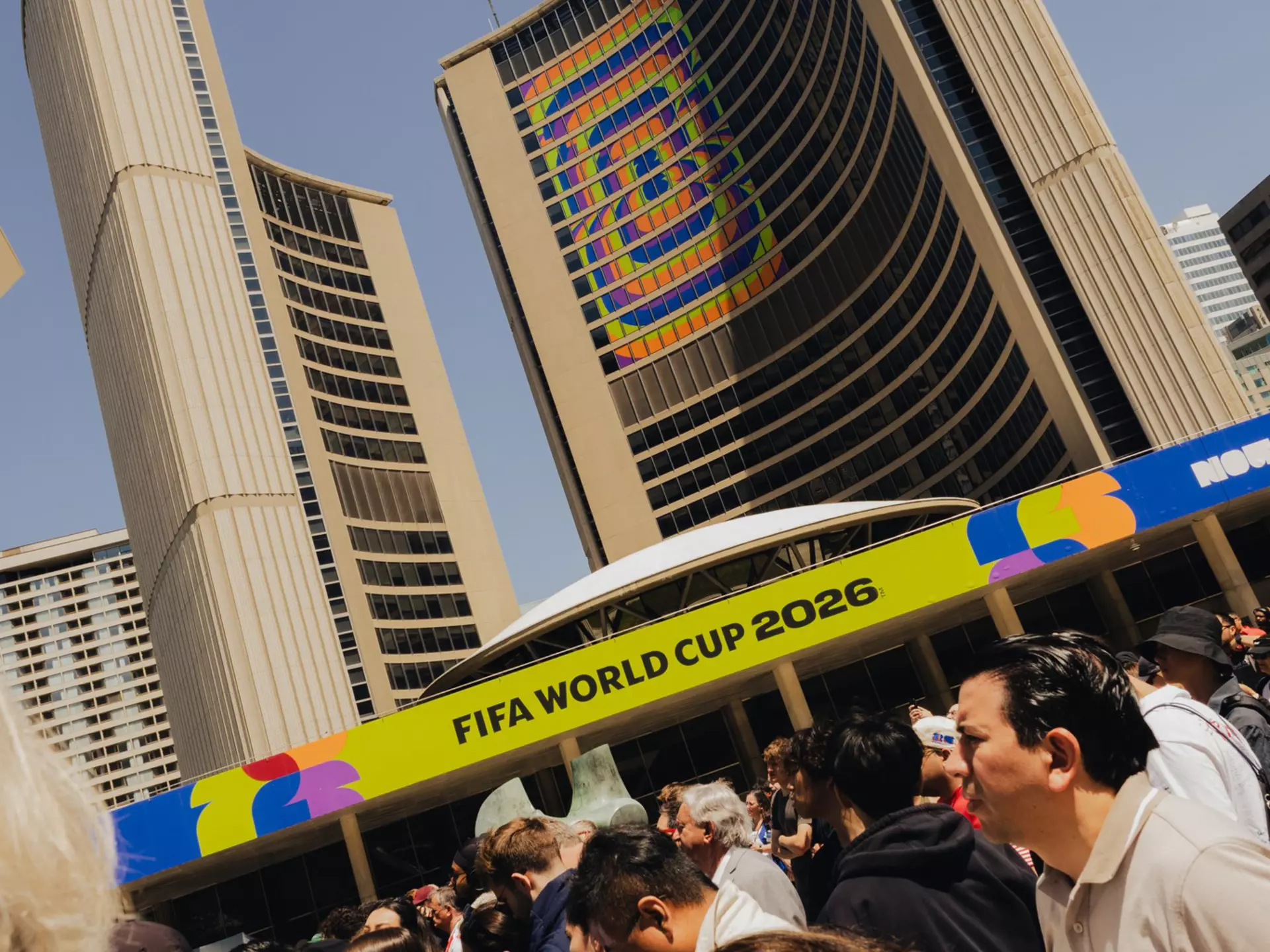 Tall building with FIFA World Cup branding in Toronto.