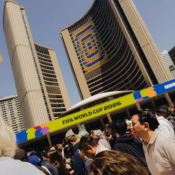 Tall building with FIFA World Cup branding in Toronto.