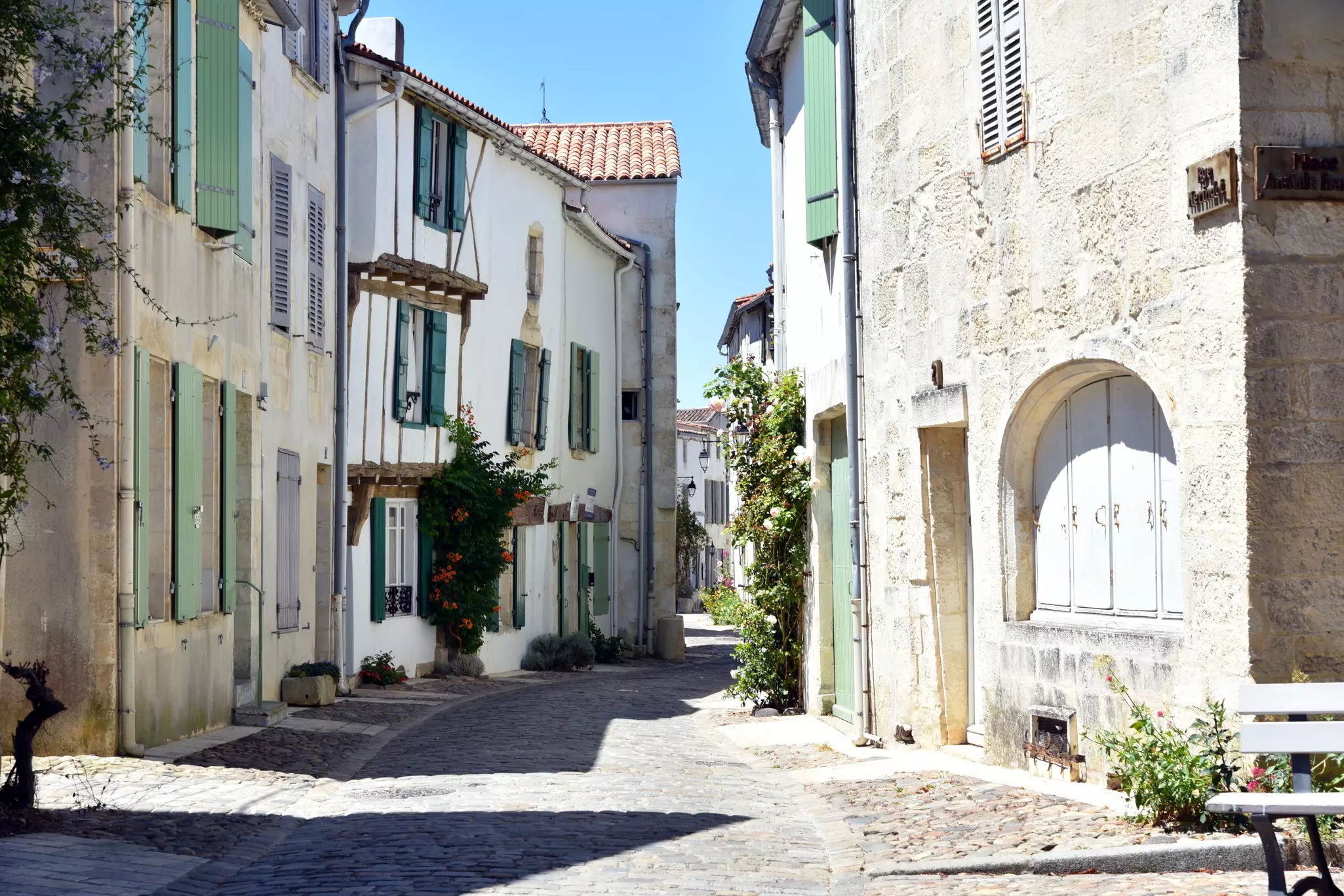 A cobbled street in a quaint French village.
