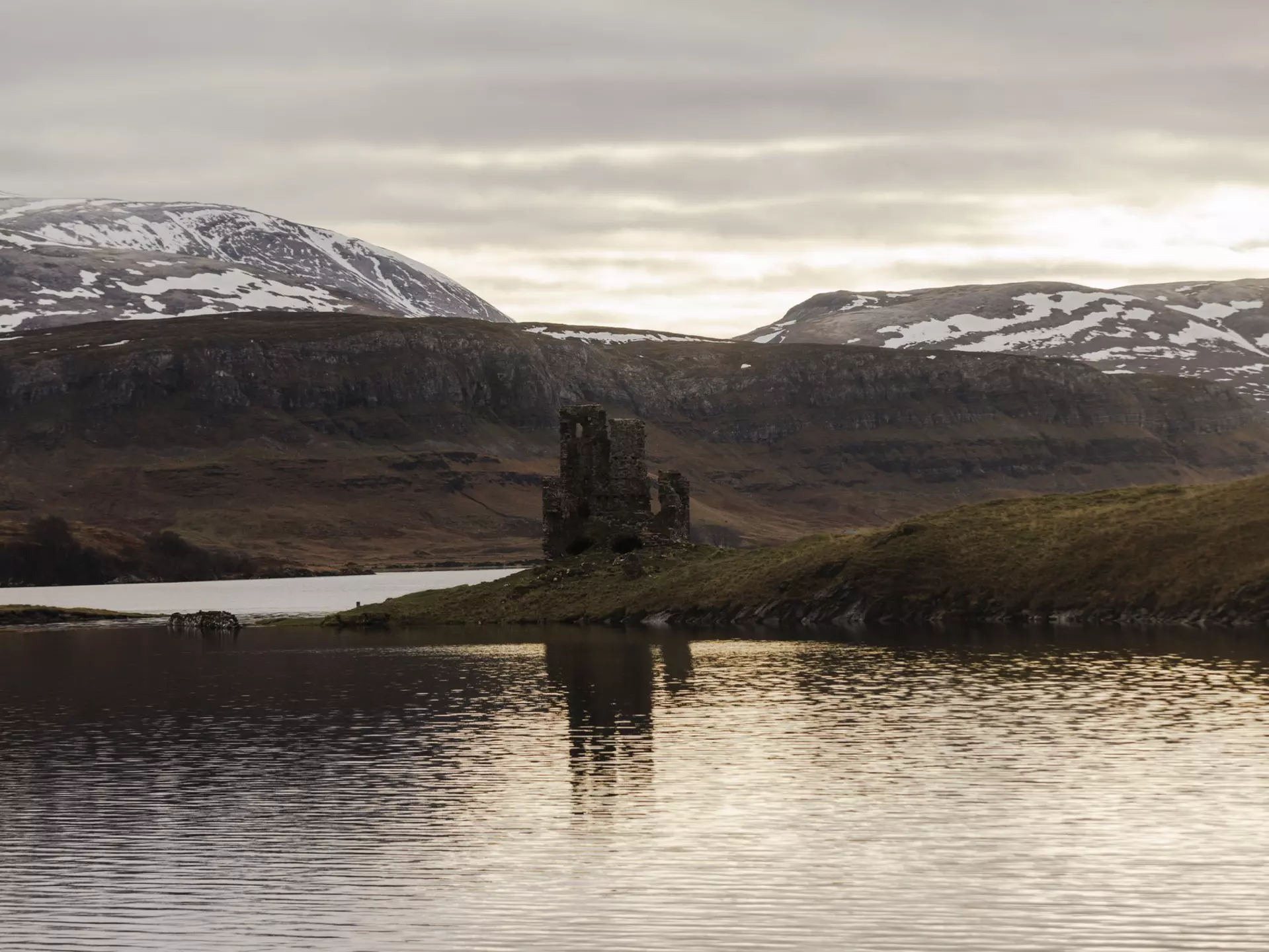 Ardvreck Castle on Loch Assynt on the NC500. Robert Ormerod for Lonely Planet