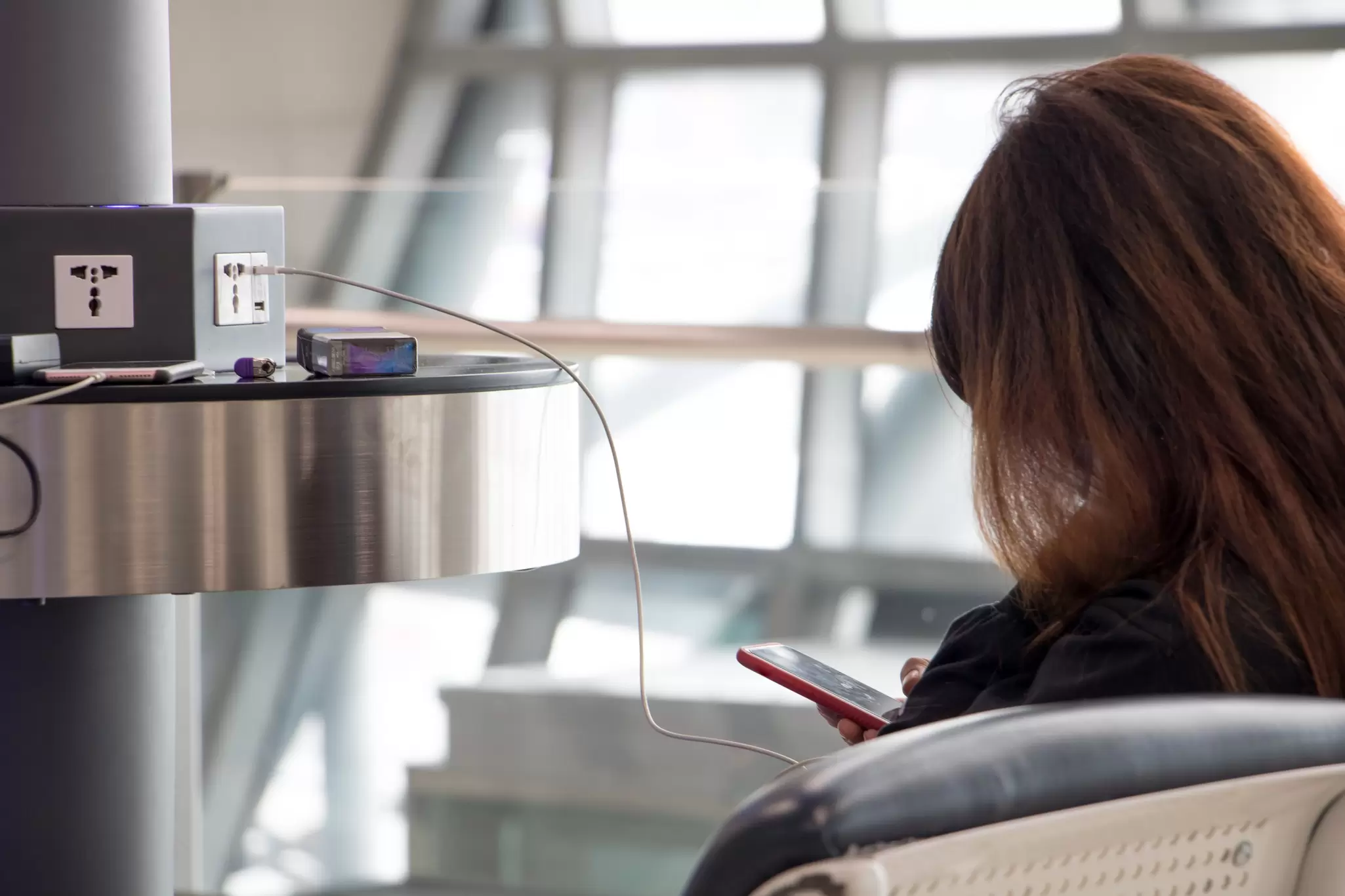 Airport charging stations are not as trustworthy as you may think. Milkovasa/Shutterstock