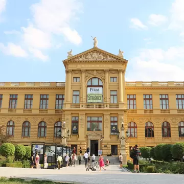 Exterior of Prague City Museum in Prague, Czech Republic. Visitors and pedestrians right outside.