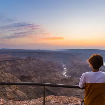 Tourist looking at the Fish River Canyon, Namibia