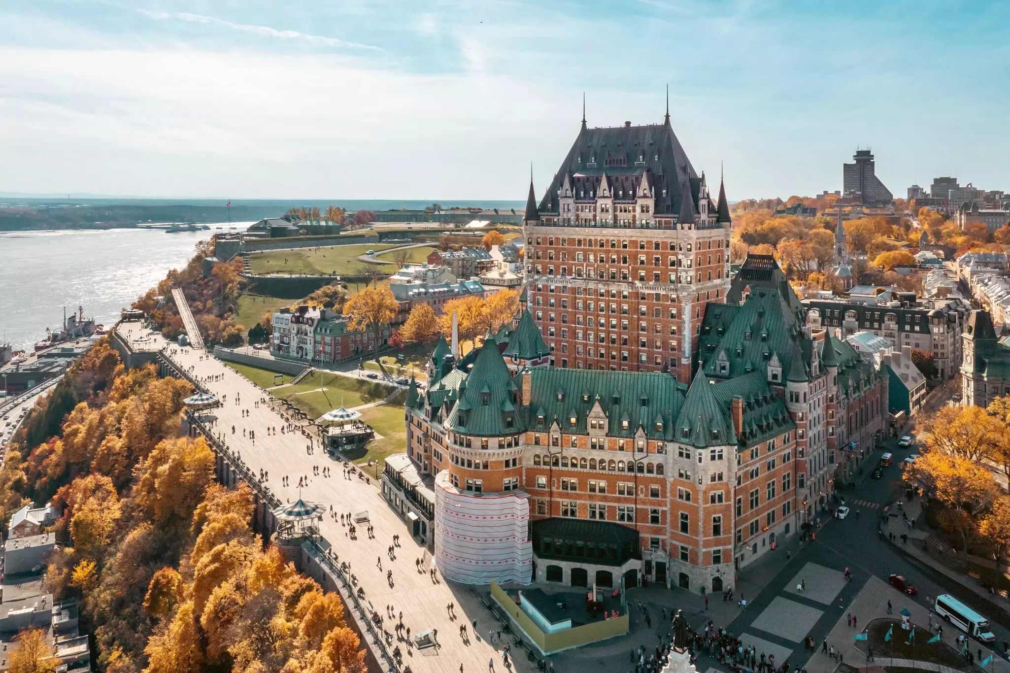 Exterior view of the Fairmont Le Château Frontenac, a historical hotel in Quebec city, during fall