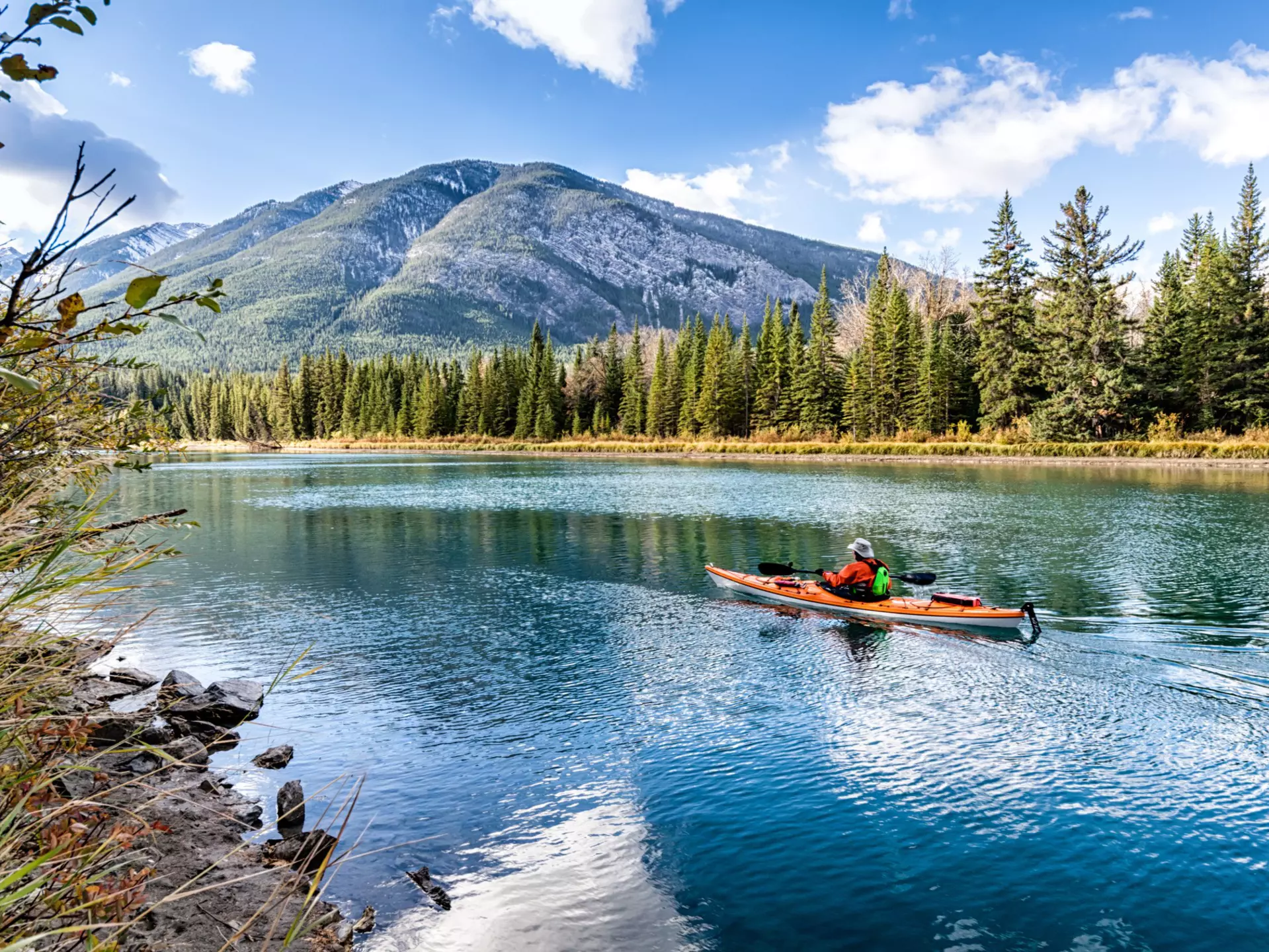 Kayaker on the Bow river near Banff