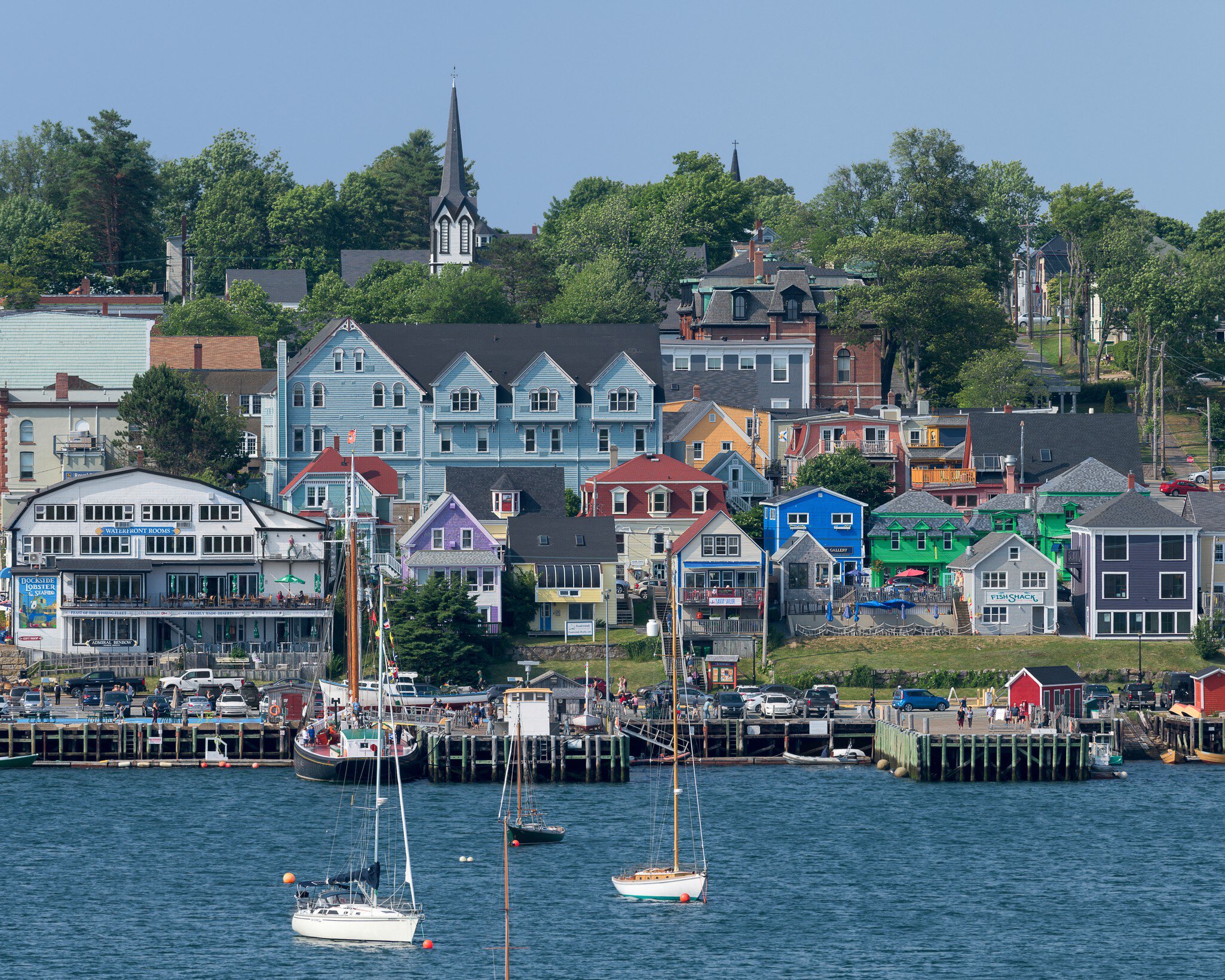 LUNENBURG, NOVA SCOTIA/CANADA - JULY 17, 2018: Waterfront cityscape of downtown Lunenburg from the other side of the harbor, License Type: media, Download Time: 2025-10-13T13:04:17.000Z, User: fabricencoredesign31, Editorial: true, purchase_order: 56530 - Guidebooks, job: Global Publishing-WIP, client: Atlantic Canada 8, other: Fabrice Robin