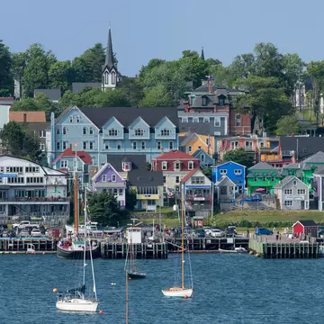 LUNENBURG, NOVA SCOTIA/CANADA - JULY 17, 2018: Waterfront cityscape of downtown Lunenburg from the other side of the harbor, License Type: media, Download Time: 2025-10-13T13:04:17.000Z, User: fabricencoredesign31, Editorial: true, purchase_order: 56530 - Guidebooks, job: Global Publishing-WIP, client: Atlantic Canada 8, other: Fabrice Robin