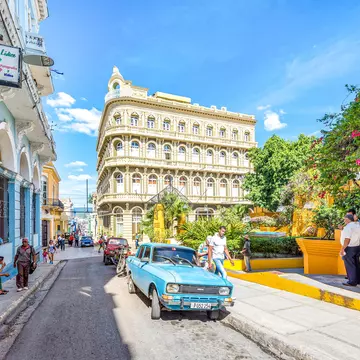 The exterior of Hotel Encanto Imperial on Las Enramadas promenade