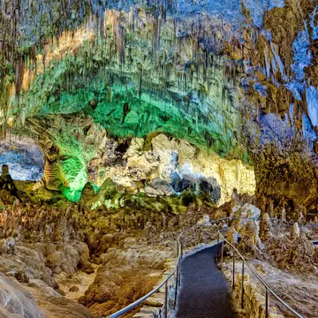 The paved, level pathway leads through the Big Room, Carlsbad Caverns, New Mexico