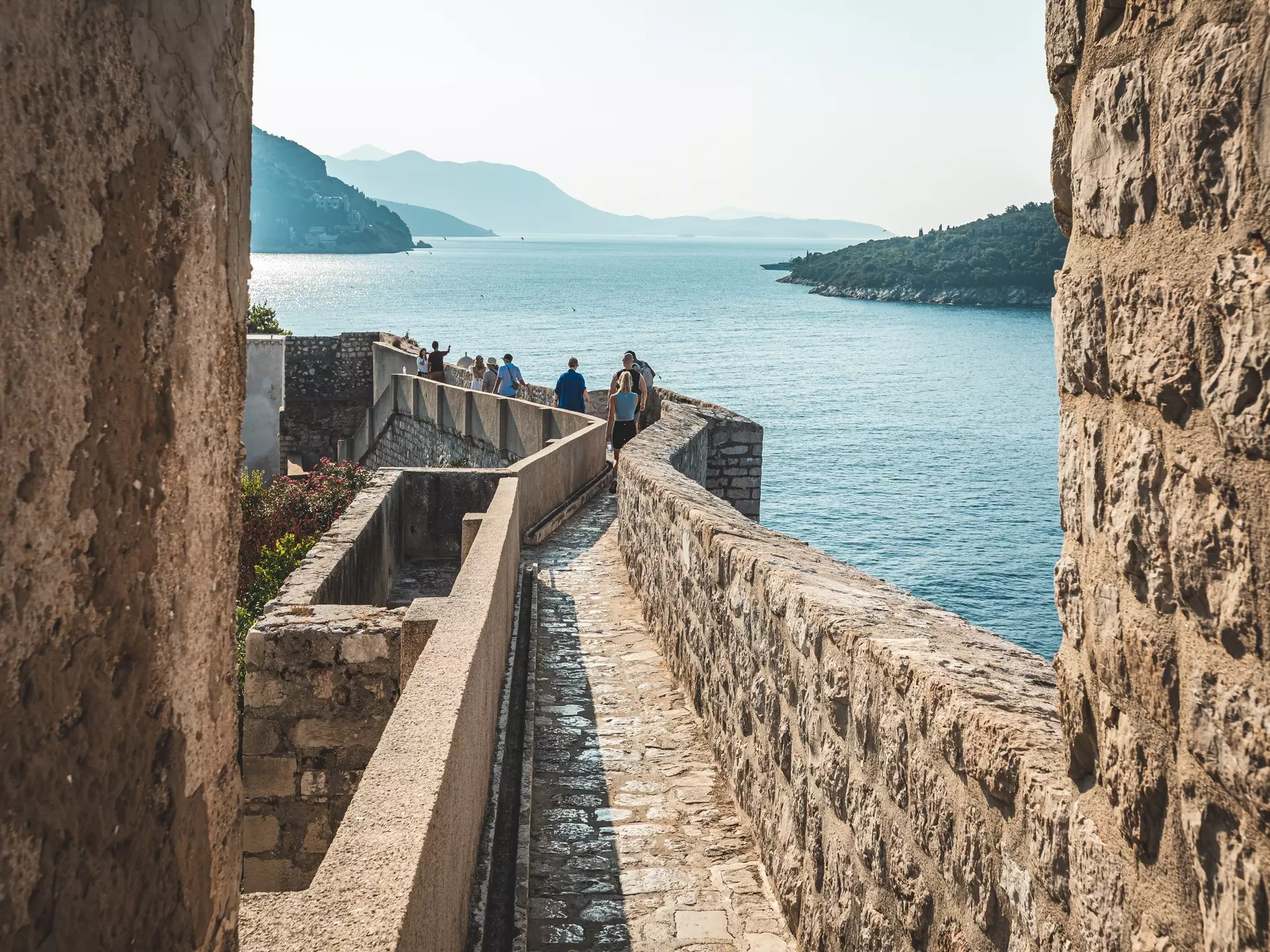 Walking the city walls of Dubrovnik, Croatia. AmauryMphotos/Shutterstock