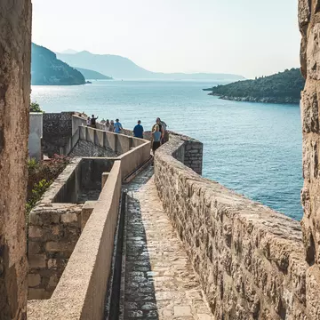 Walking the city walls of Dubrovnik, Croatia. AmauryMphotos/Shutterstock