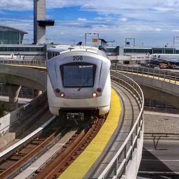The AirTrain at John F Kennedy International Airport. You can get to all of New York City’s three airports by public transport. Sergi Reboredo/VW Pics/Getty Images