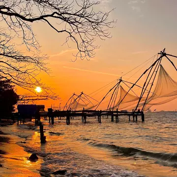 Chinese fishing net (Cheenavala) at sunset in Fort Kochi, Kerala, India.