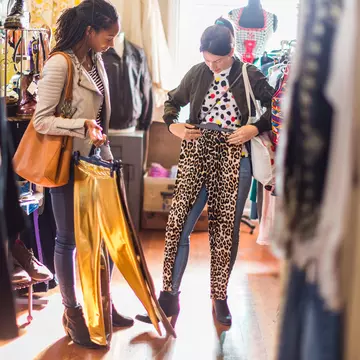 Two young women looking at clothes inside a vintage clothes store in South Africa.
1163489898
City Life, Cheerful, Choice, Fun, Buying, Color Image, Fashionab, Fashionable, Shopaholic, Retro Style, Boutique, Retail, Lifestyles, Adult, People, Trying On, Enjoyment, Small Business, Women, Friendship, City, Young Adult, 20-29 Years, Consumerism, Young Women, Togetherness, Fitting Room, Thrift Store, Retail Place, South Africa, Clothes Rack, Horizontal, Only Women, Clothing Store, Fashion, Looking, Store, Getting Dressed, Leisure Activity, Adults Only, Photography, Old-fashioned, Two People, Afro-Caribbean Ethnicity, Shopping, Females, Finance and Economy, Choosing, Business Finance and Industry, Sale, Business, Customer