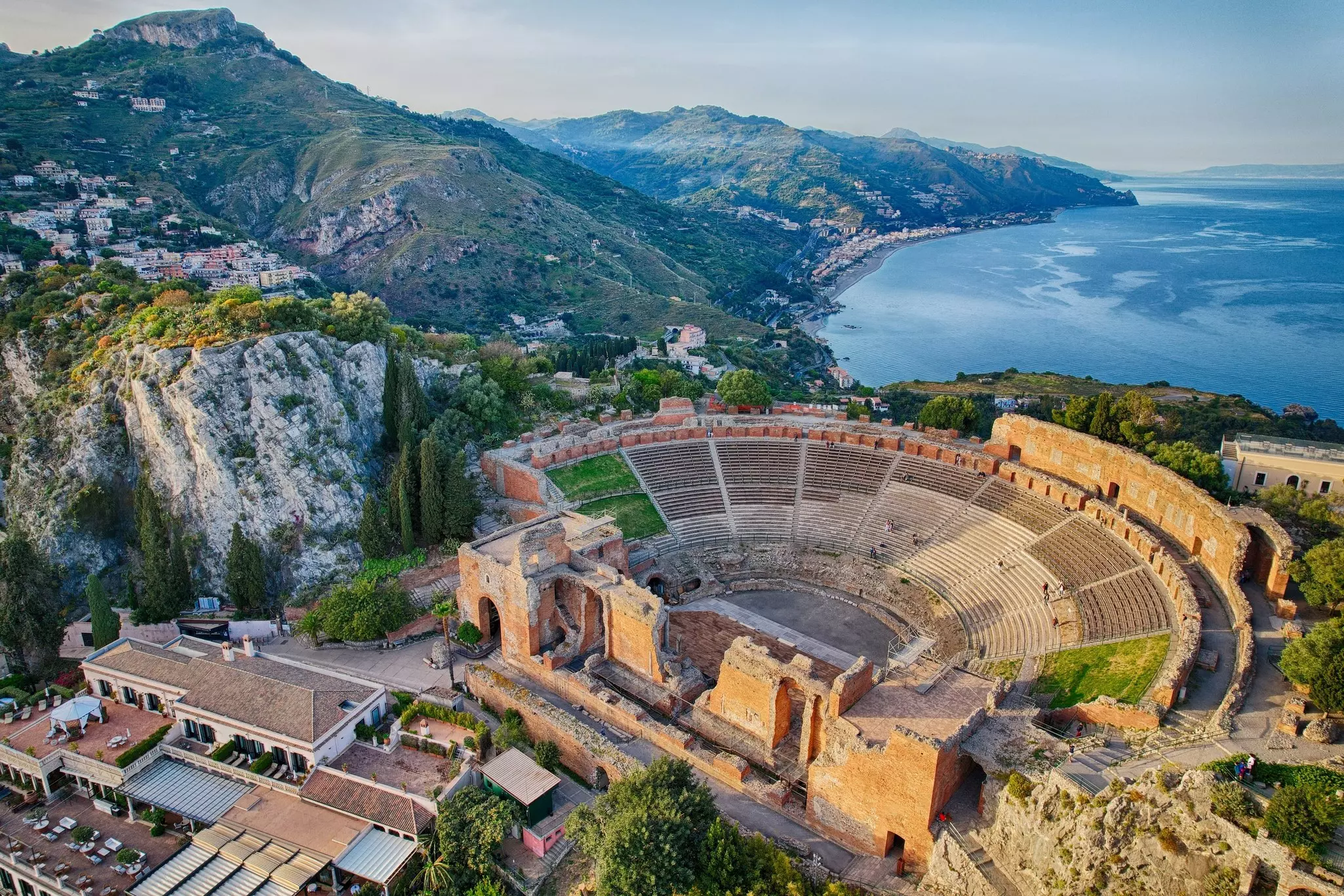 An aerial view over the ancient Greek amphitheater in the city of Taormina in Sicily, Italy.