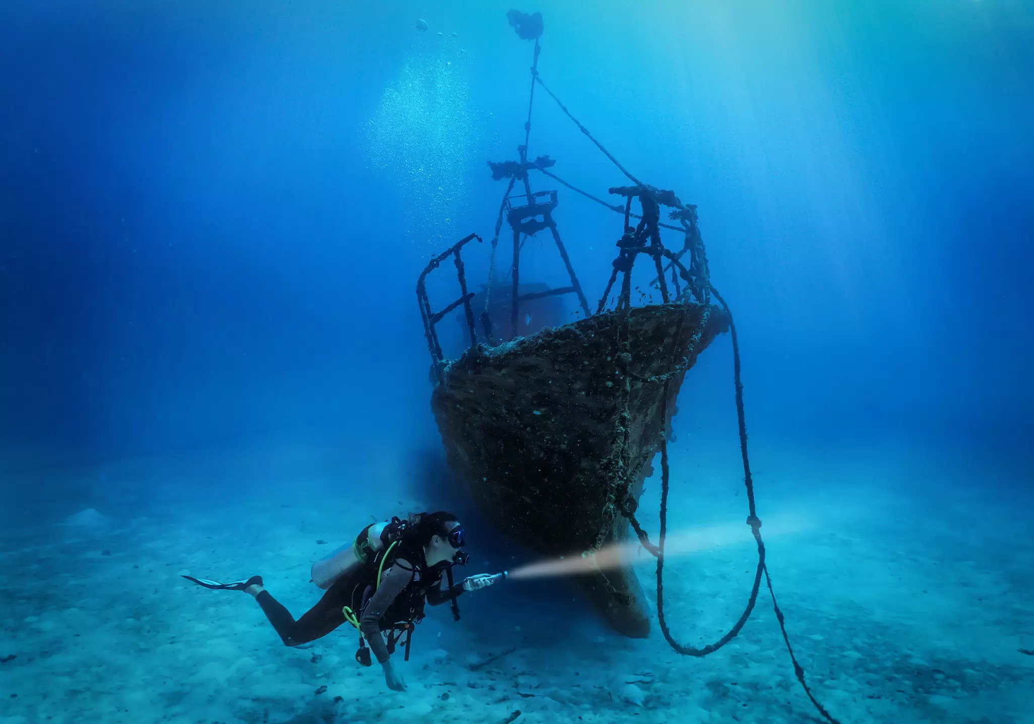 Exploring a sunken shipwreck. Sven Hansche/Shutterstock