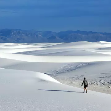 The spring and fall are great times to explore the rolling dunes of White Sands in New Mexico. Shutterstock.