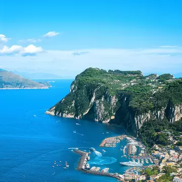 A beautiful view of Marina Grande, Island Capri, with the Peninsula of Sorrento in the background.
