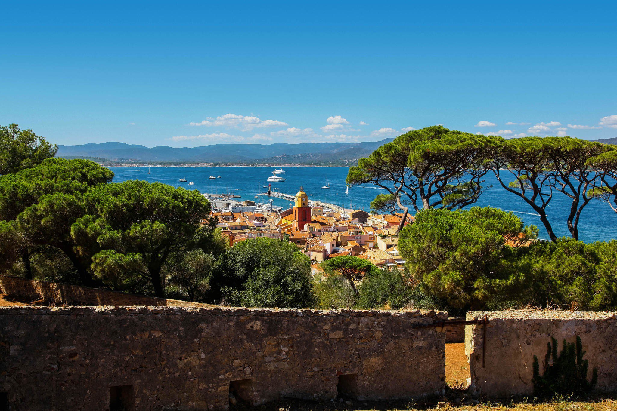 St Tropez old town with the clock tower and harbour, as seen from the citadel.