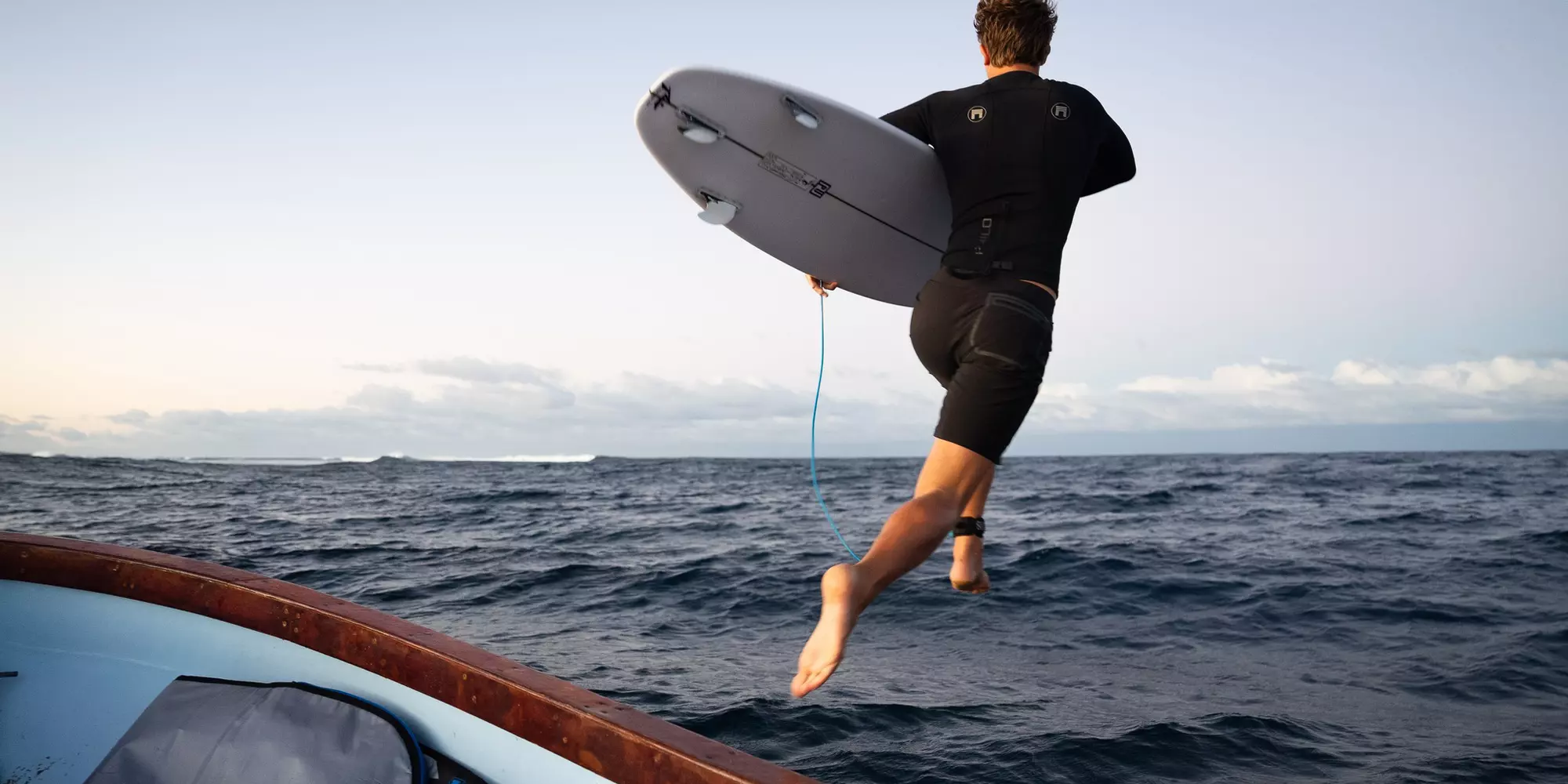 Surfer in Fiji — BIT 2025