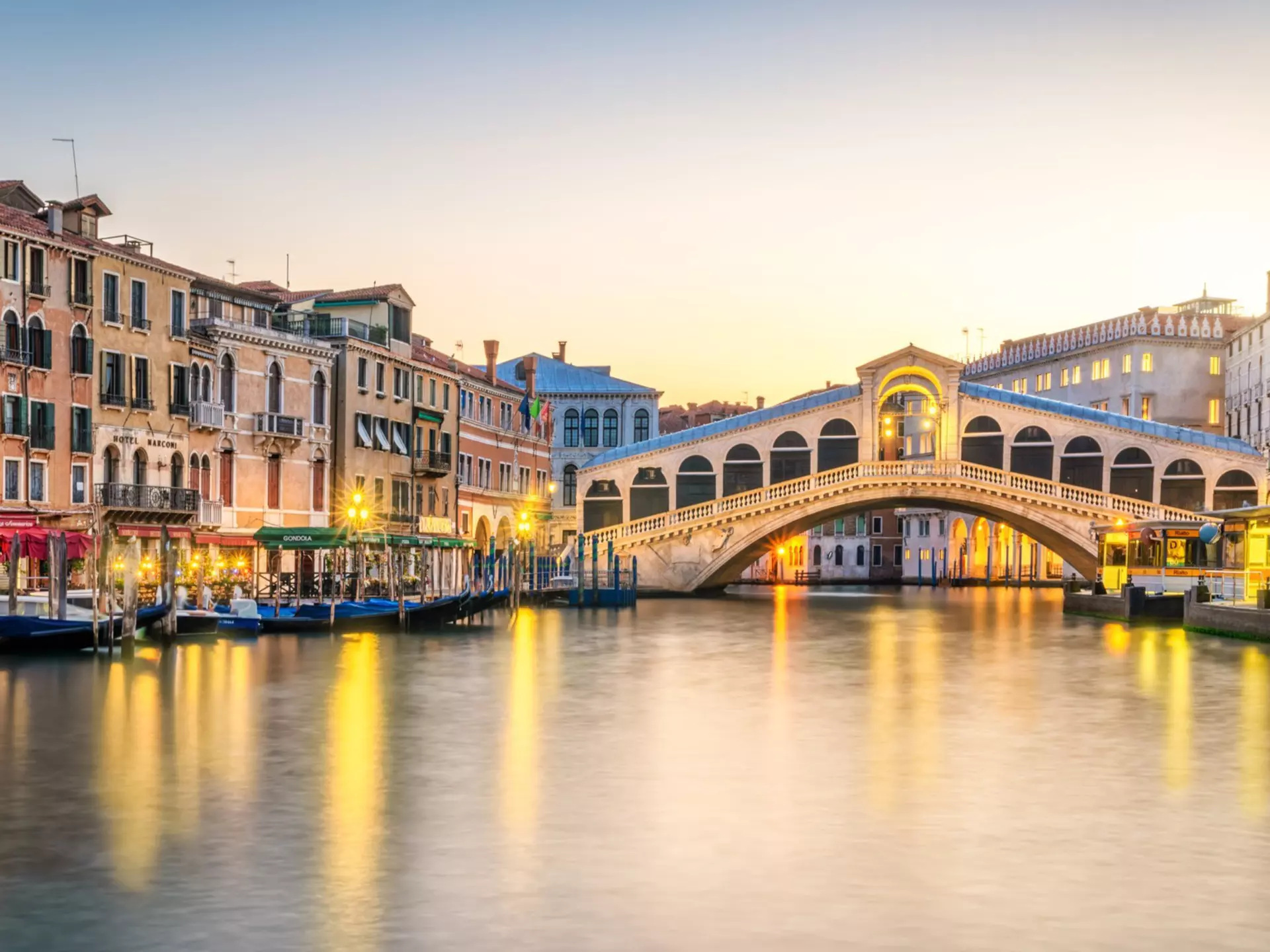 Early morning at the Rialto Bridge and Grand Canal, Venice. Eloi_Omella/Getty Images