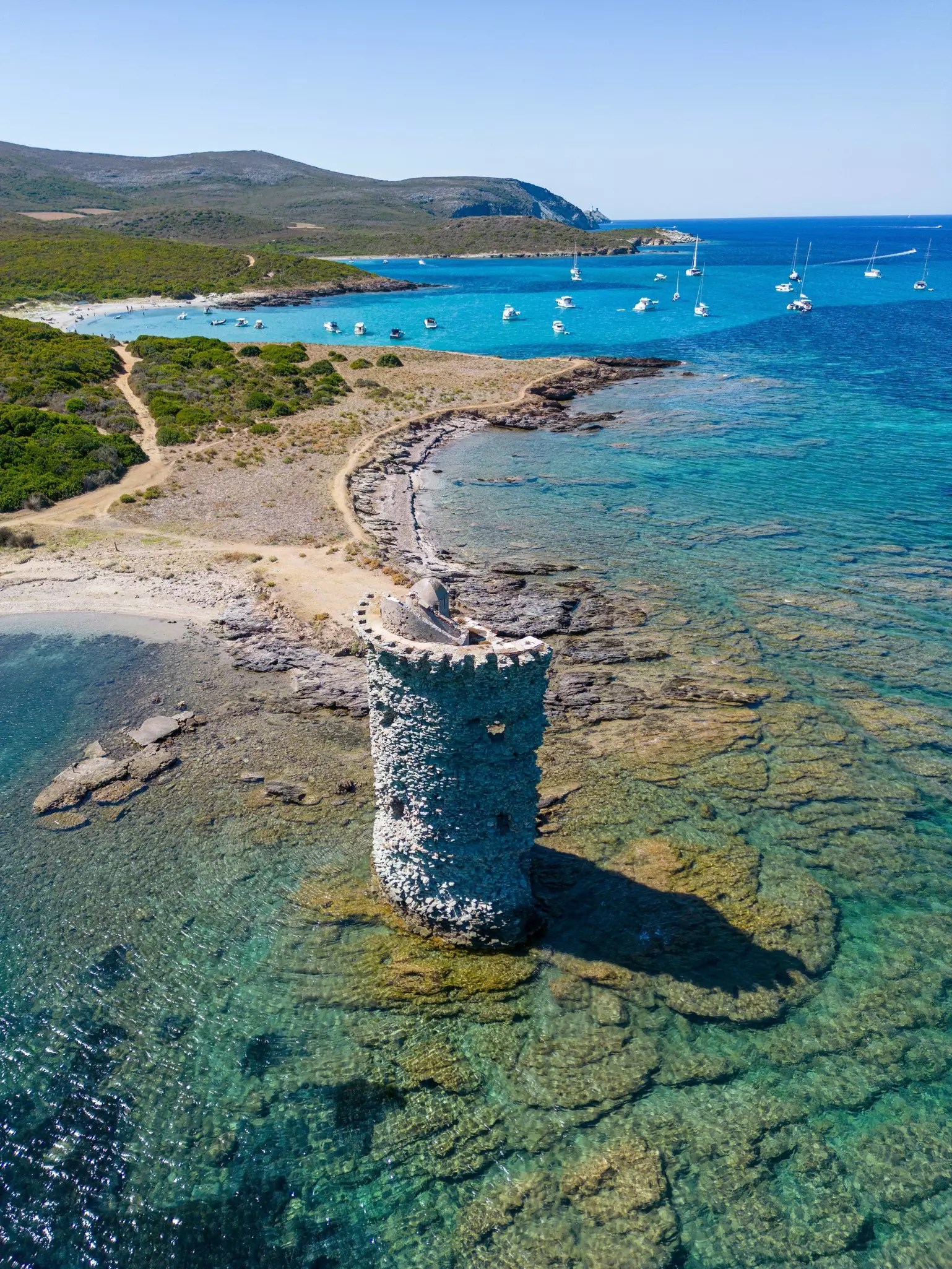 Aerial view along Corsica's coastal hiking route.