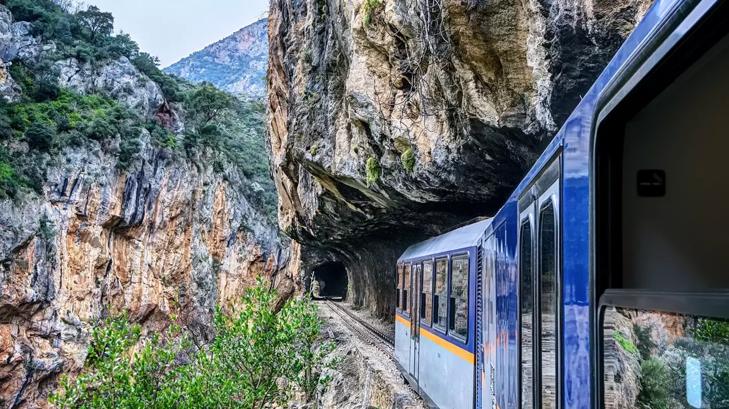 Odontotos rack railway Diakopto – Kalavrita in Vouraikos gorge, with tracks dug on rocky cliffs.