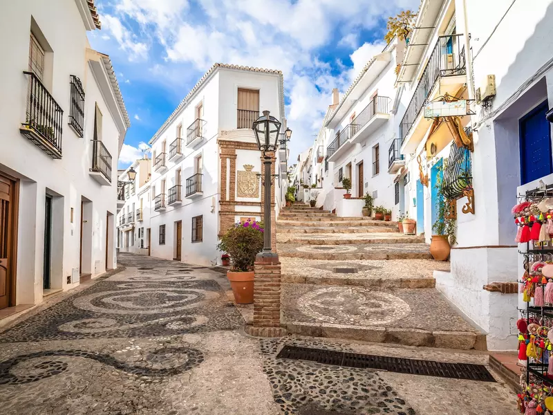 A whitewashed village with smooth polished tiles.