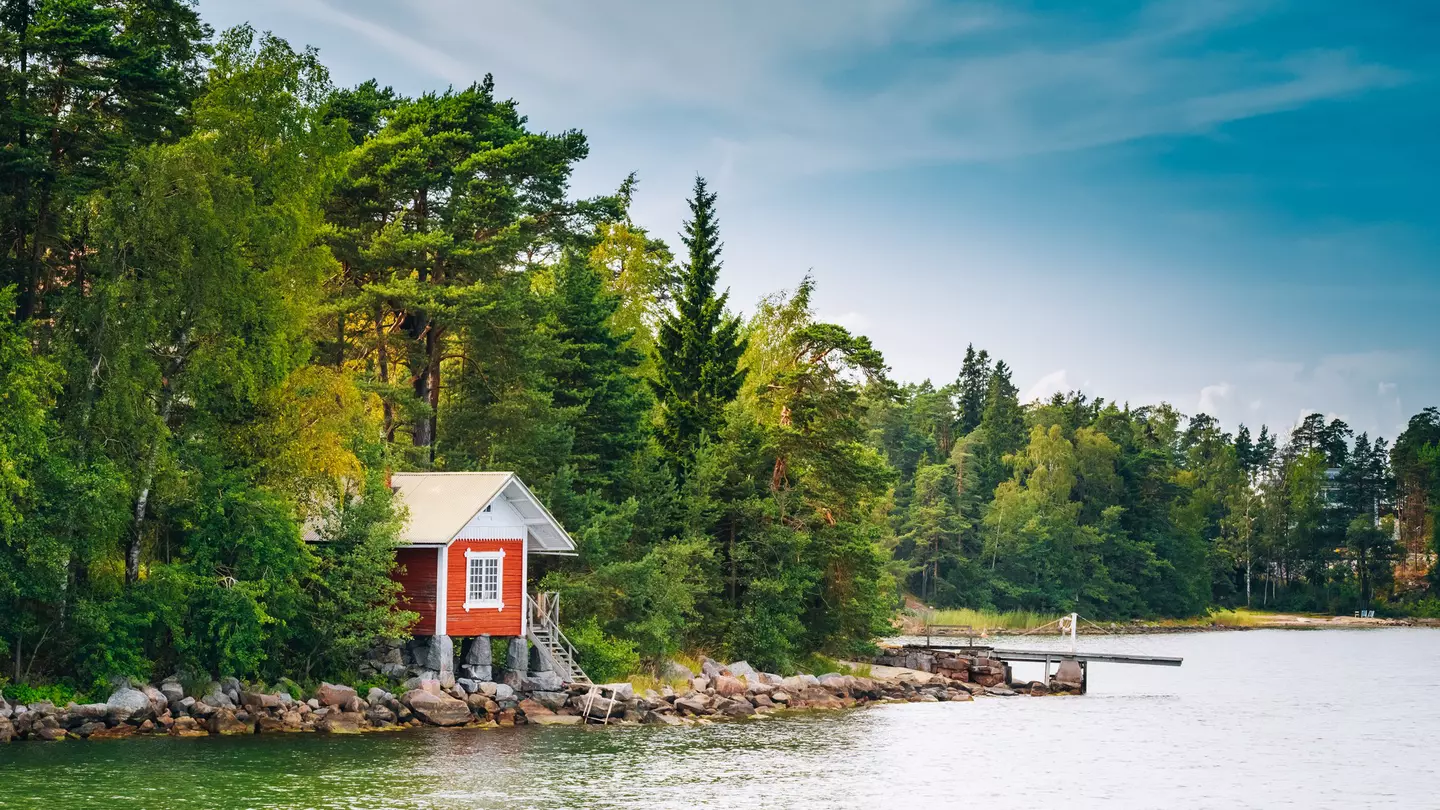 Red Finnish Wooden Bath Sauna Log Cabin In Summer