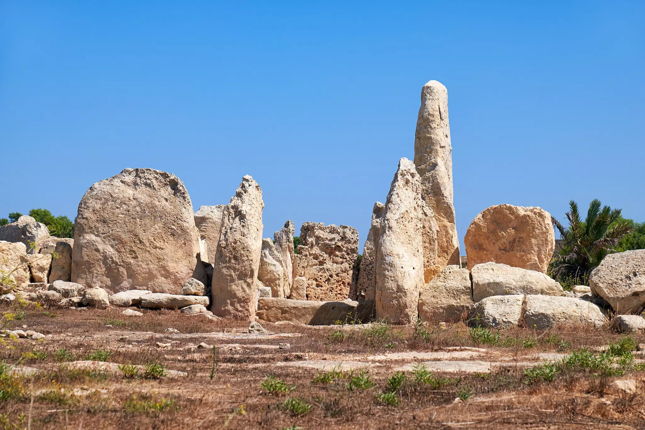 Large upright stone slabs forming entrance to the oldest part of Haġar Qim