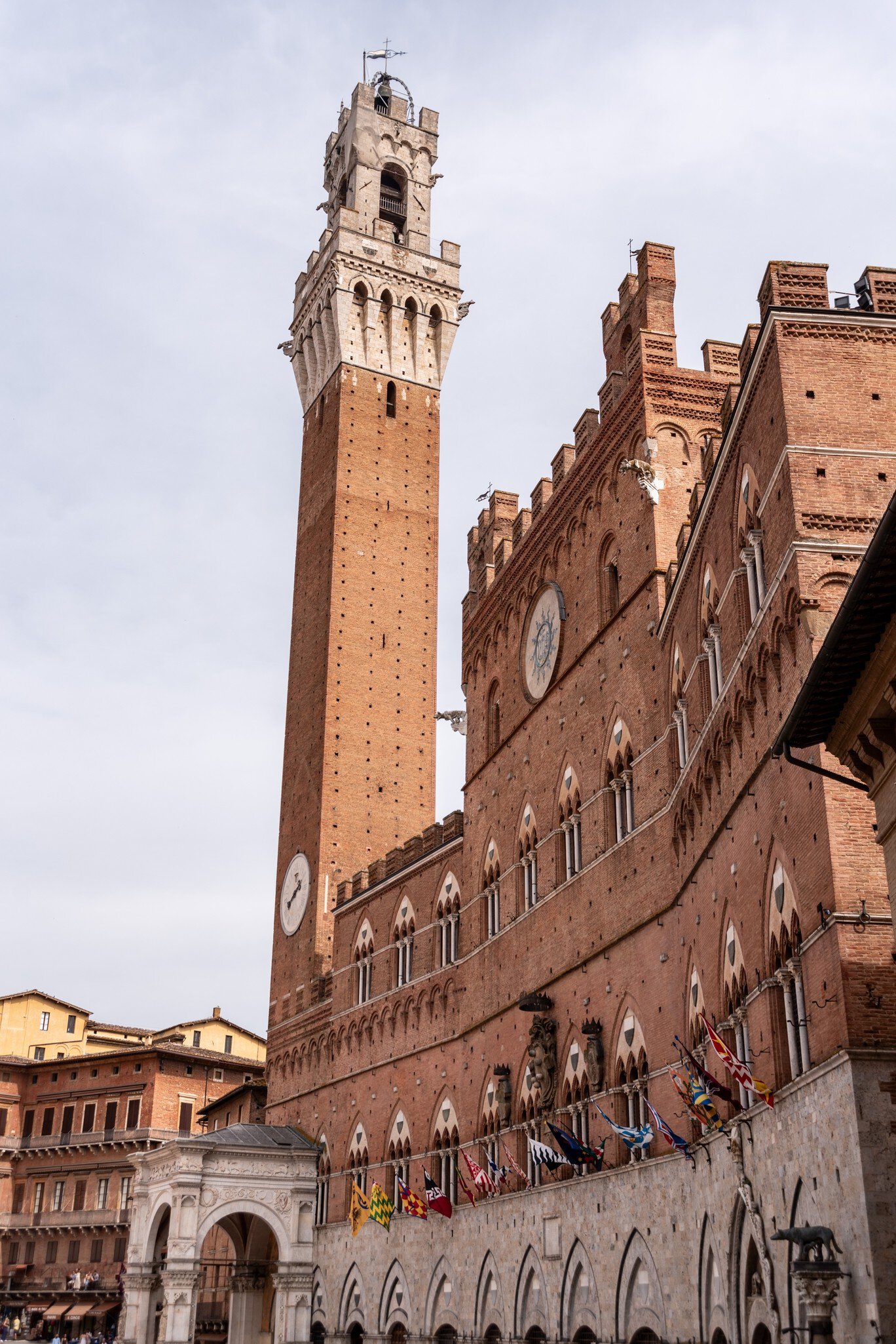 The iconic Palazzo Pubblico at the Piazza del Campo in downtown Siena, Italy.