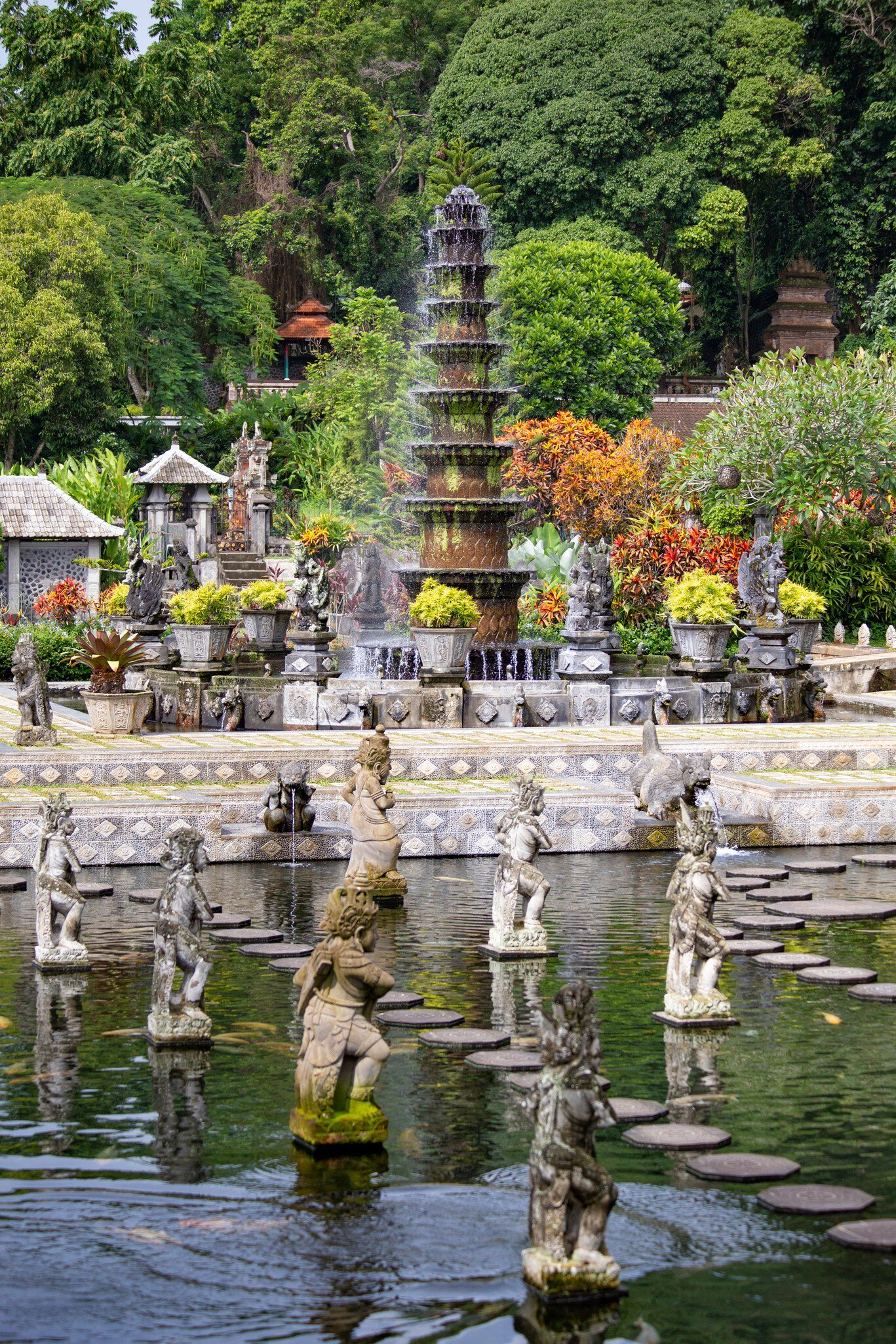 BALI, INDONESIA - March 2020: Beautiful fountains on the pond at Taman Tirta Gangga Holy Water Temple view in Bali, Indonesia  License Type: media  Download Time: 2024-03-18T03:20:43.000Z  User: mvm_lonelyplanet  Is Editorial: Yes  purchase_order:   