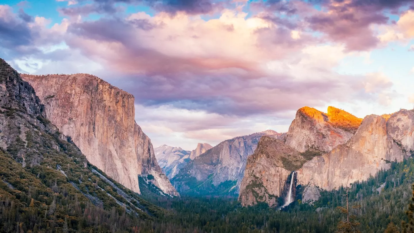 Evening view from the Tunnel View overlook in Yosemite National Park.  Seen are the icons of the park: El Capitan, Half Dome and Bridalveil Falls.