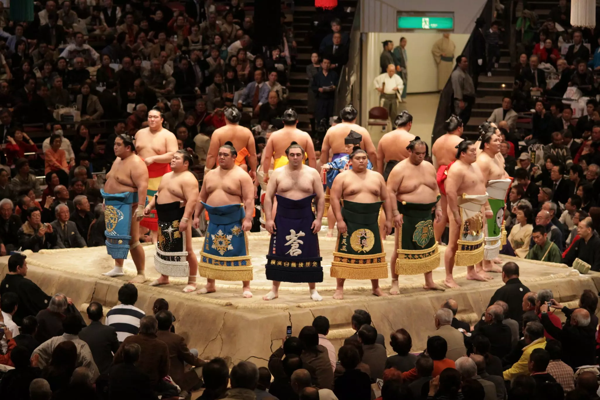 Sumo wrestlers line up in the Tokyo Grand Sumo Tournament