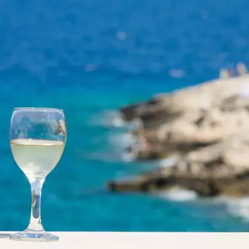 Local wine in Korčula, Croatia. Antonio Petrone/Shutterstock