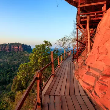 Cliff side wooden bridge at Wat Phu tok temple , Bueng Kan, Thailand