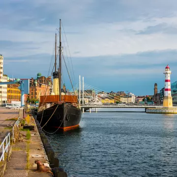 Boat in Malmö waterway. Allard Schager / Getty Images
