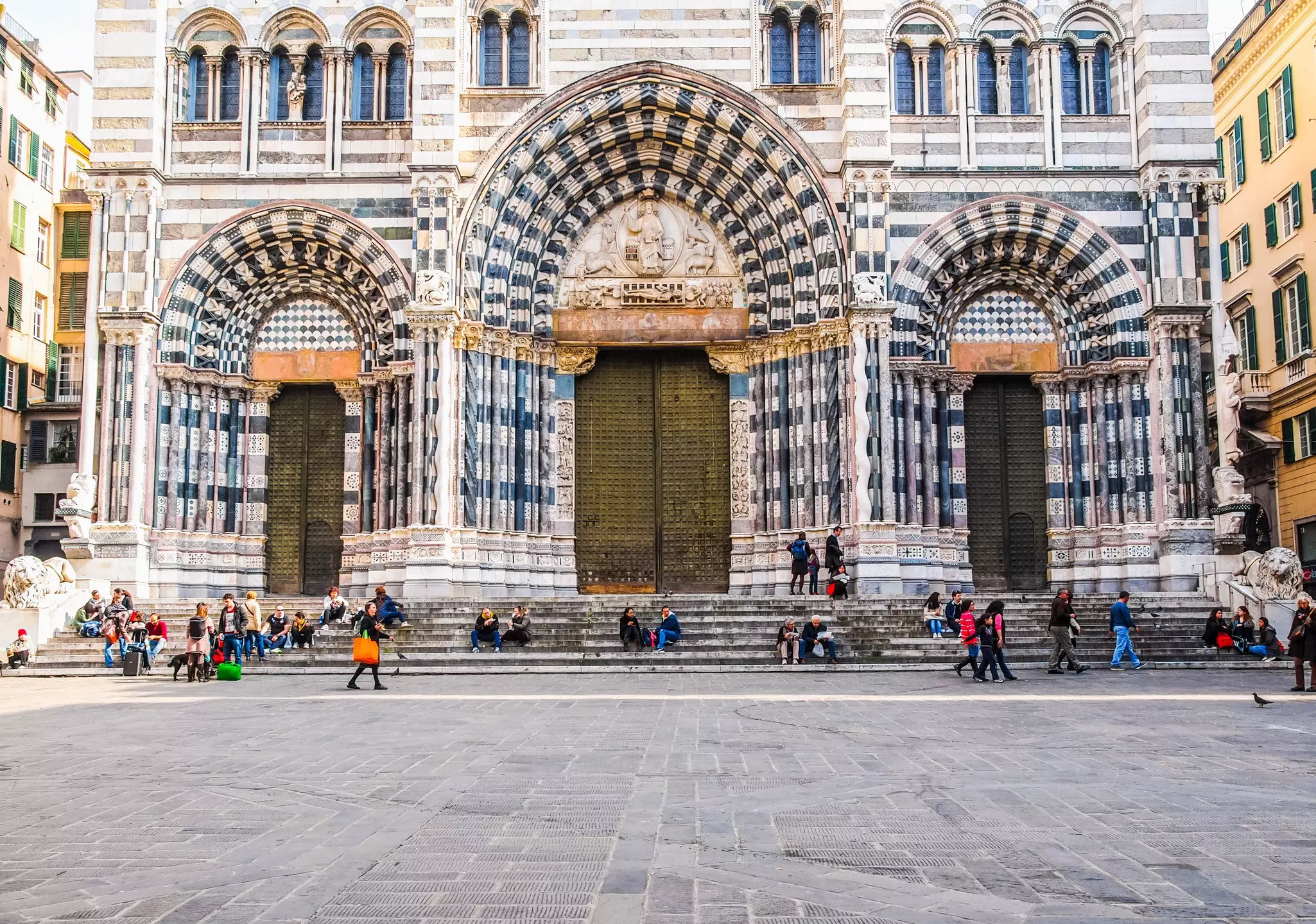 GENOA, ITALY - MARCH 16, 2014: Tourists in front of the gothic Cathedral aka Duomo di Genova or Cattedrale di San Lorenzo seat of the Archbishop of Genoa (HDR), License Type: media, Download Time: 2025-09-16T19:46:36.000Z, User: katelyn.perry_lonelyplanet, Editorial: true, purchase_order: 65050 - Digital Destinations and Articles, job: wip, client: wip, other: Katelyn Perry