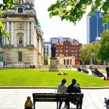 May 2019: City Hall Palace Gardens on a sunny day.
1423237676
architectural, architecture, attraction, belfast, blue, building, capital, center, centre, city, cityscape, columns, destination, dome, europe, grass, hall, historic, history, ireland, irish, kingdom, landmark, northern, northern ireland, old, outdoor, palace, place, port, river, sightseeing, sky, skyline, square, stone, summer, titanic, tourism, tourist, tower, town, travel, uk, ulster, united, united kingdom, view, water, waterfront