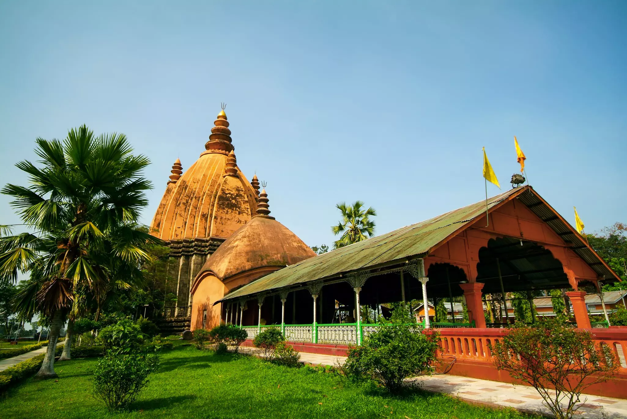 An ancient temple with a modern wooden entrance