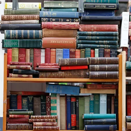 Souvenirs displayed at a street stall on Portobello Market, in Notting Hill district, largest antique market in UK, famous tourist attractions, London, UK.