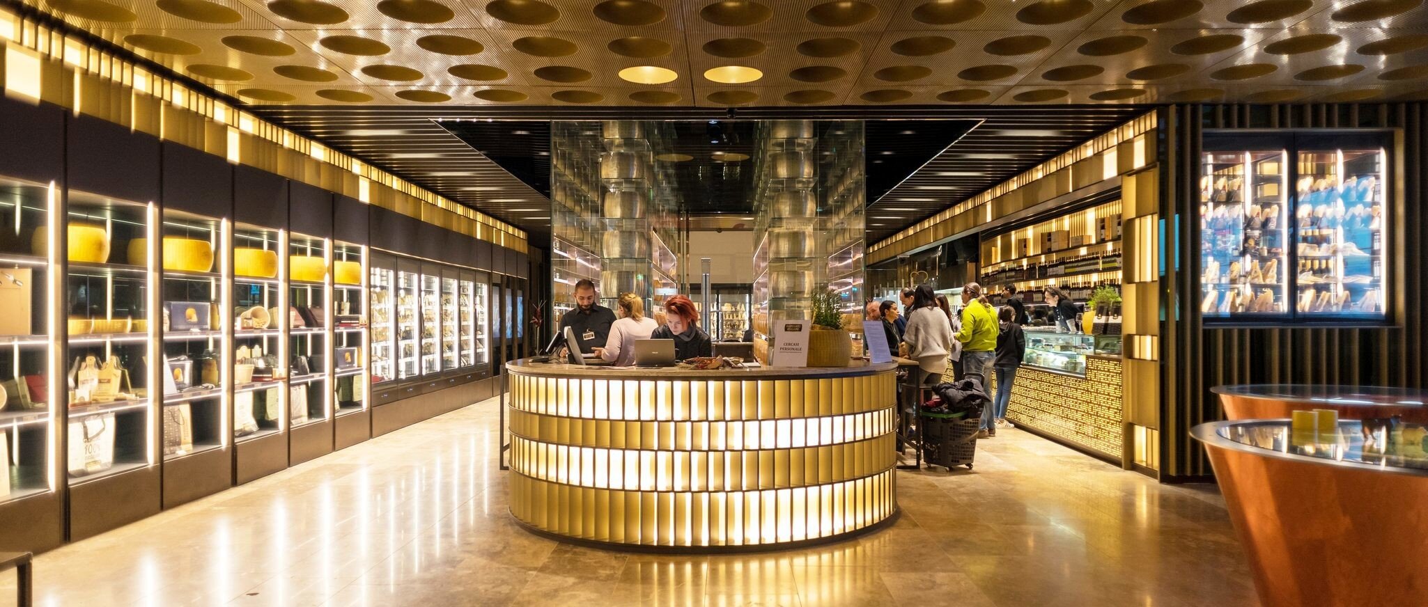 BOLOGNA, ITALY - CIRCA DECEMBER, 2017: Parmiggiano Reggiano store inside Fico Eataly World, located in Bologna, is the largest agrofood park in the world. Internal view.; Shutterstock ID 768732697; your: Bridget Brown; gl: 65050; netsuite: Online ...