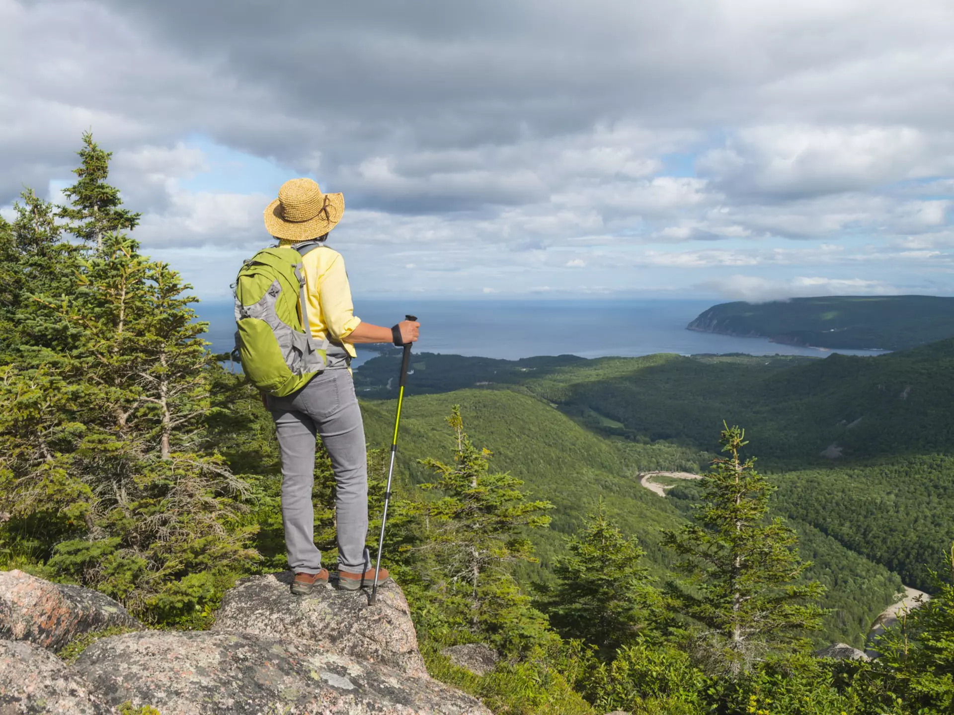 Female hiker standing at the top of a mountain in Cape Breton Highlands National Park.
512302024
Scenics - Nature, Canada, Hiking Pole, Body Conscious, Backpack, Travel Destinations, Horizontal, Getting Away From It All, Tourist, Hiking, Nature, Mature Women, Travel, Healthy Lifestyle, Eco Tourism, Beauty In Nature, Wellbeing, Hat, Maritime Provinces, Cape Breton Island, Yellow, Vacations, Gulf of St Lawrence, Recreational Pursuit, Cape Breton Highlands National Park, 103626, Nova Scotia, Cabot Trail, On Top Of, Women, Tourism, Outdoor Pursuit, Outdoors, Footpath, People, Summer, Mountain, Photography, Wilderness Area, Adult, Landscape, Active Seniors, Mature Adult, National Park, Landscape - Scenery, Mountain Peak