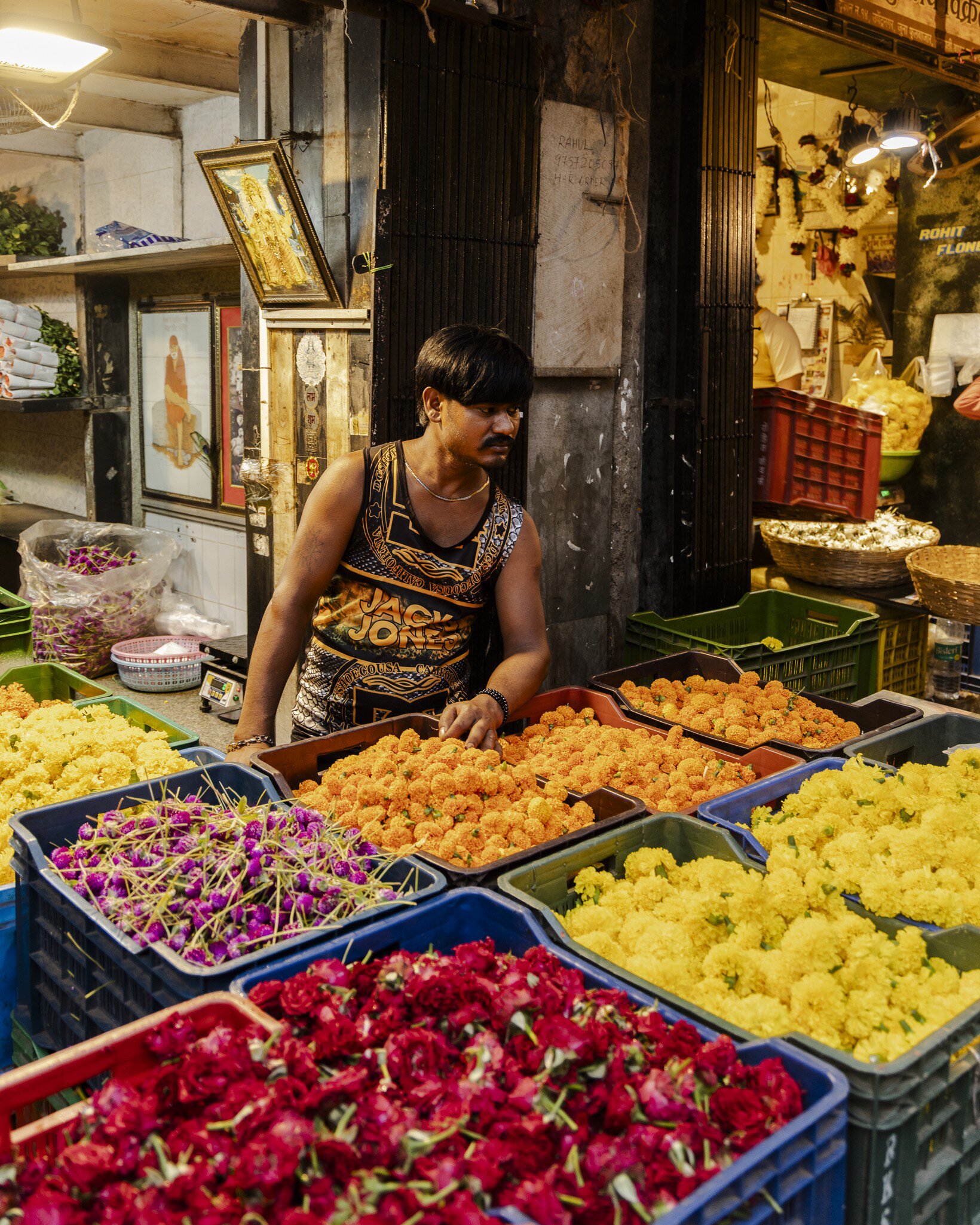 Flower vendor at Dadar Flower market in Mumbai, India.