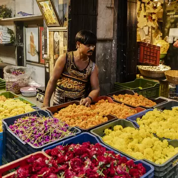 Flower vendor at Dadar Flower market in Mumbai, India.
