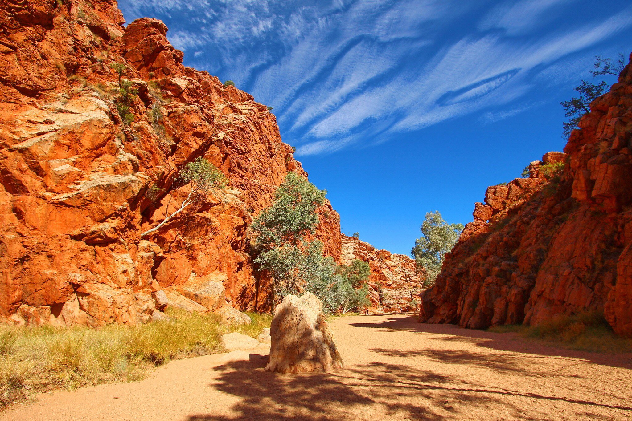Ground view of Emily Gap with bright blue sky, MacDonnell Ranges, Australia.