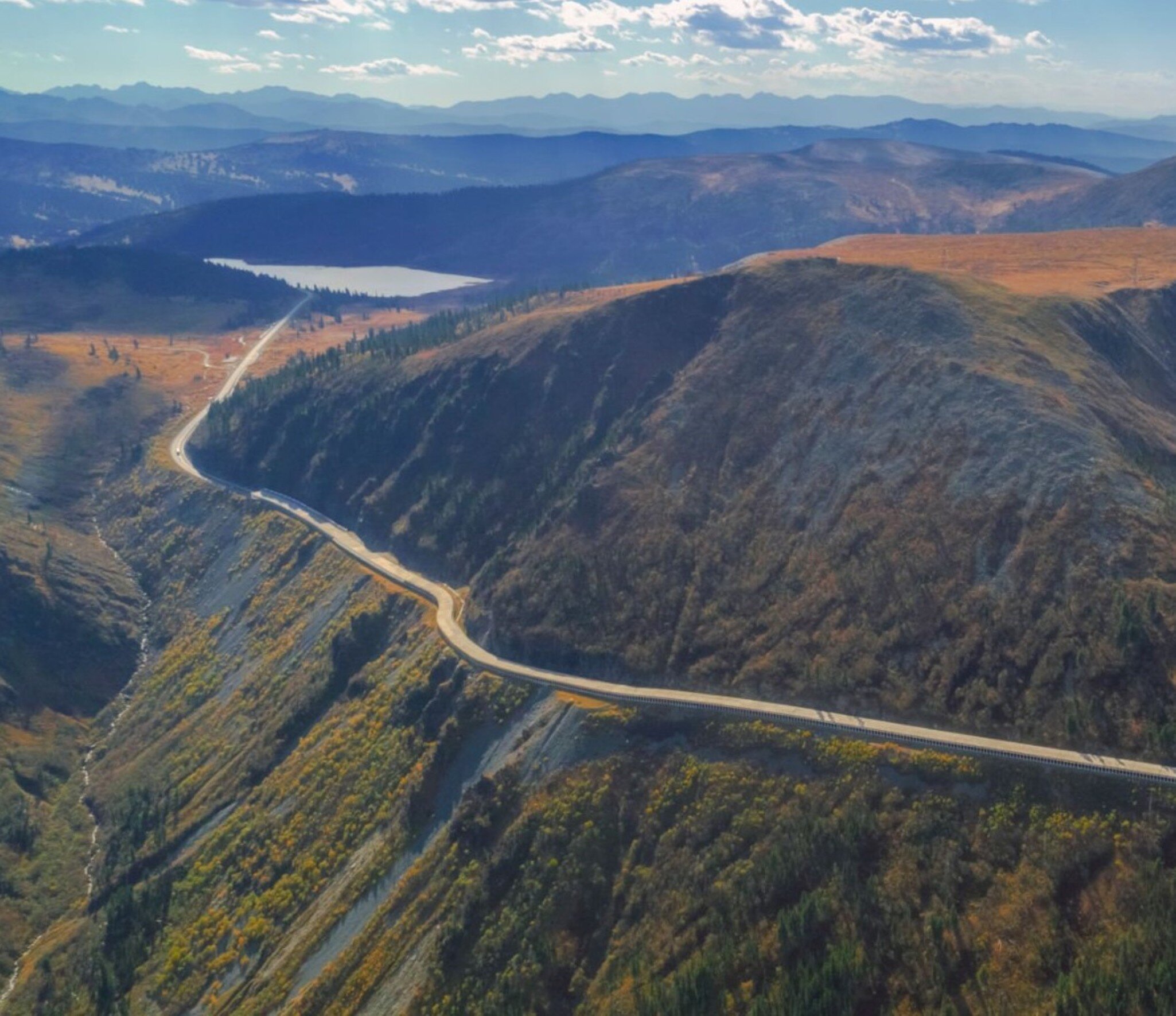 Aerial view of a winding road in the Parc National des Grands Jardins in Canada.